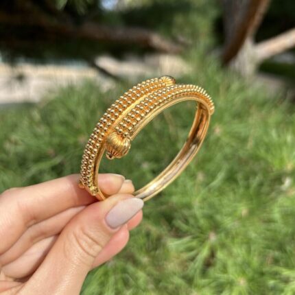 Bratara vintage confectionata manual din aur de 22k 